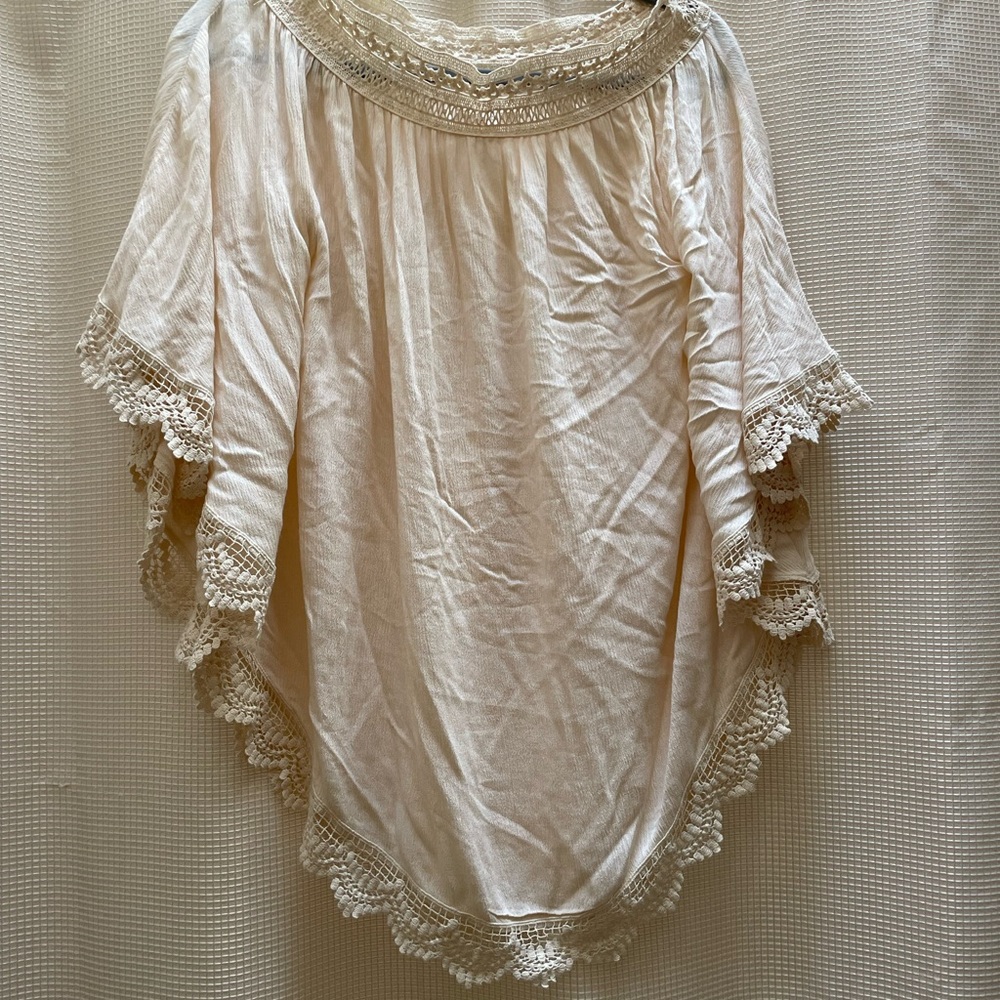 Scalloped blouse off the shoulder